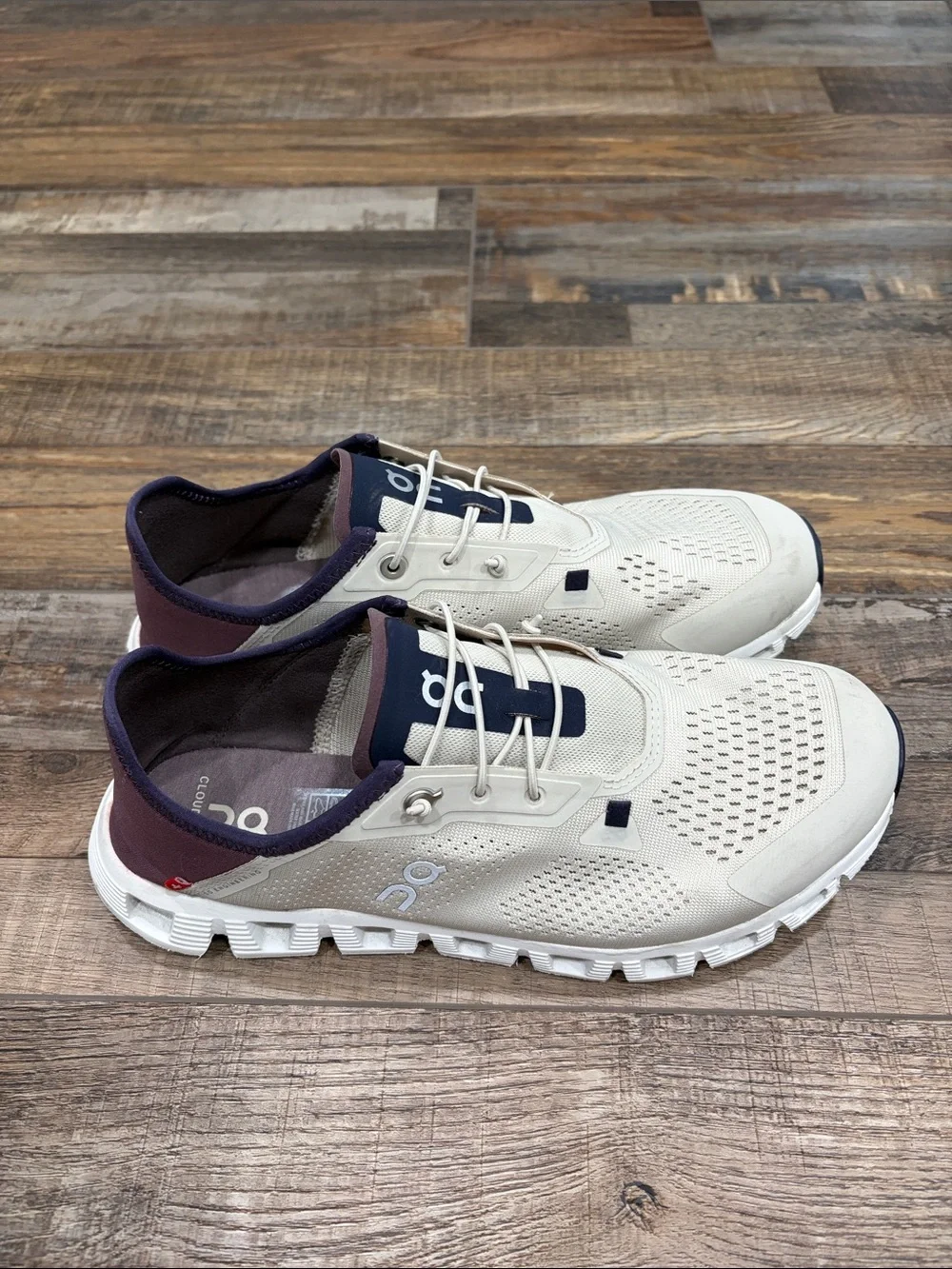 On Running Women's Sneakers in Cream and Navy Accent